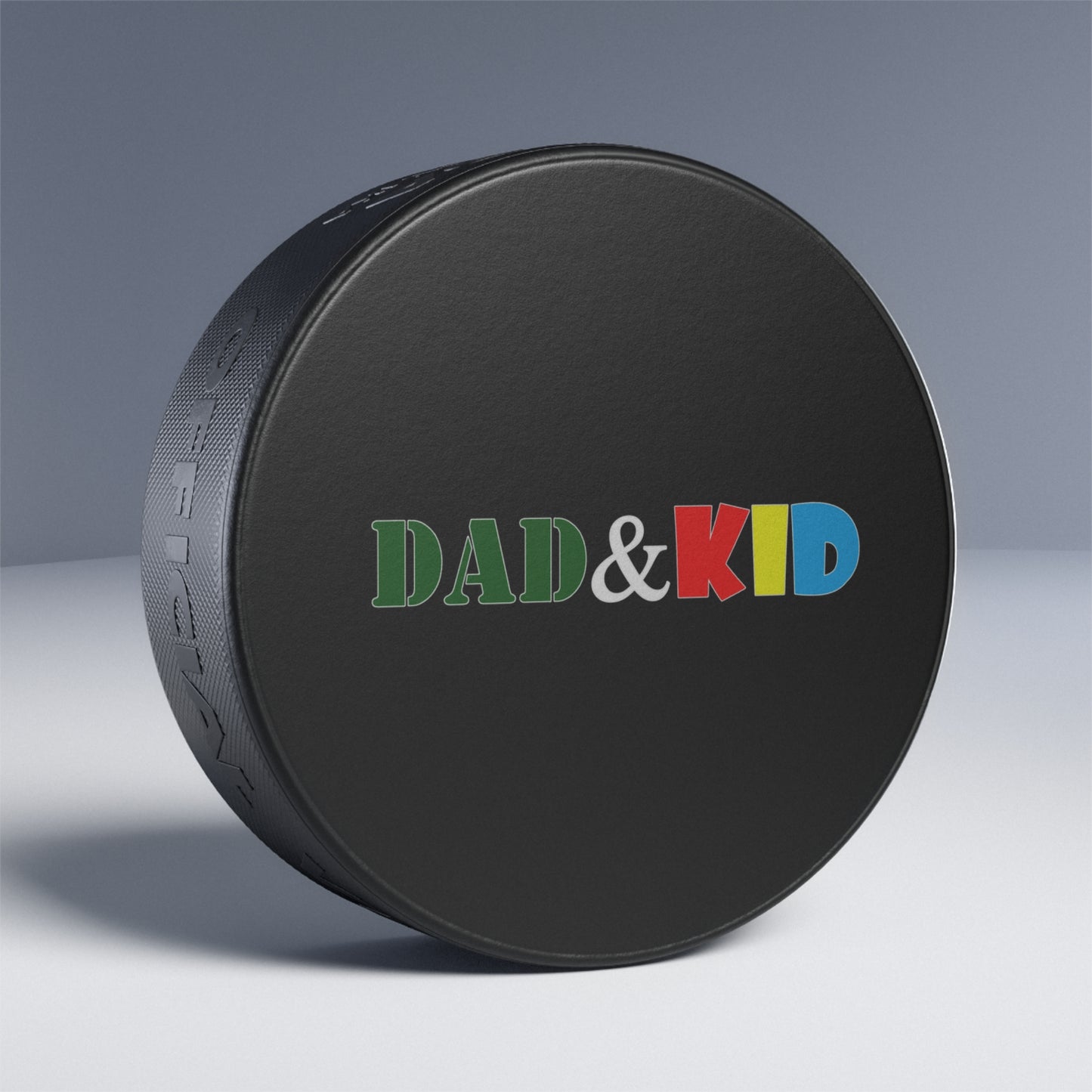 Hockey Puck — "DAD & KID" Color-Block Logo