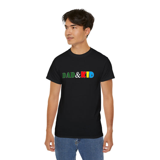 Person wearing a black t-shirt with 'DAD & KID' text in colorful letters on a white background