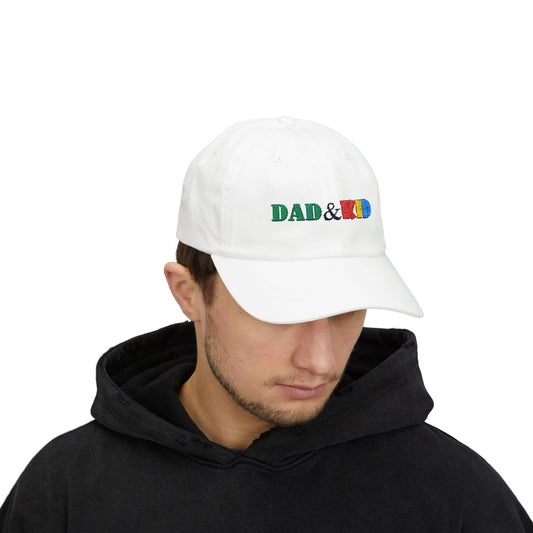 Person wearing a white cap with colorful text on a white background