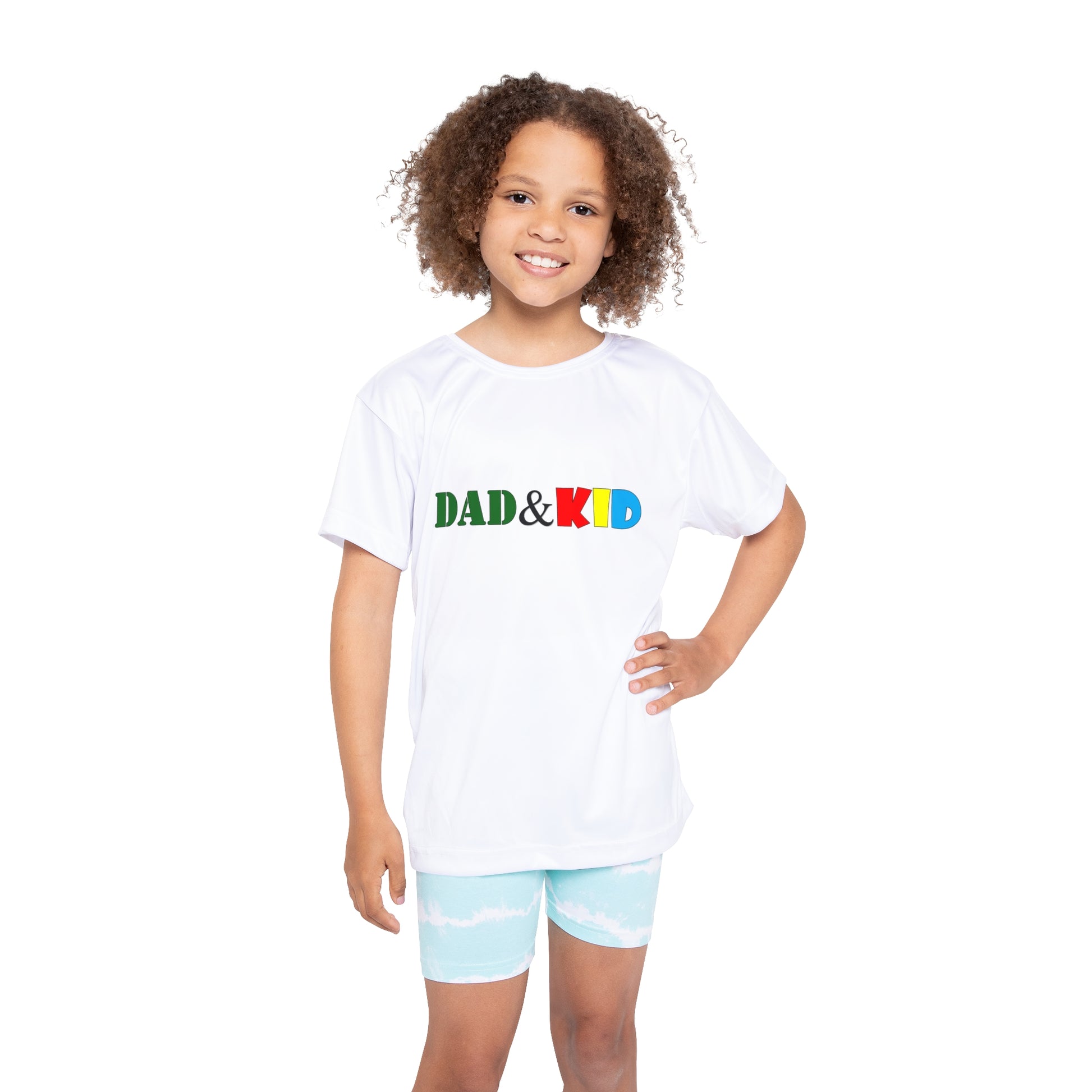 Child wearing a white t-shirt with 'DAD & KID' text in colorful letters on a white background